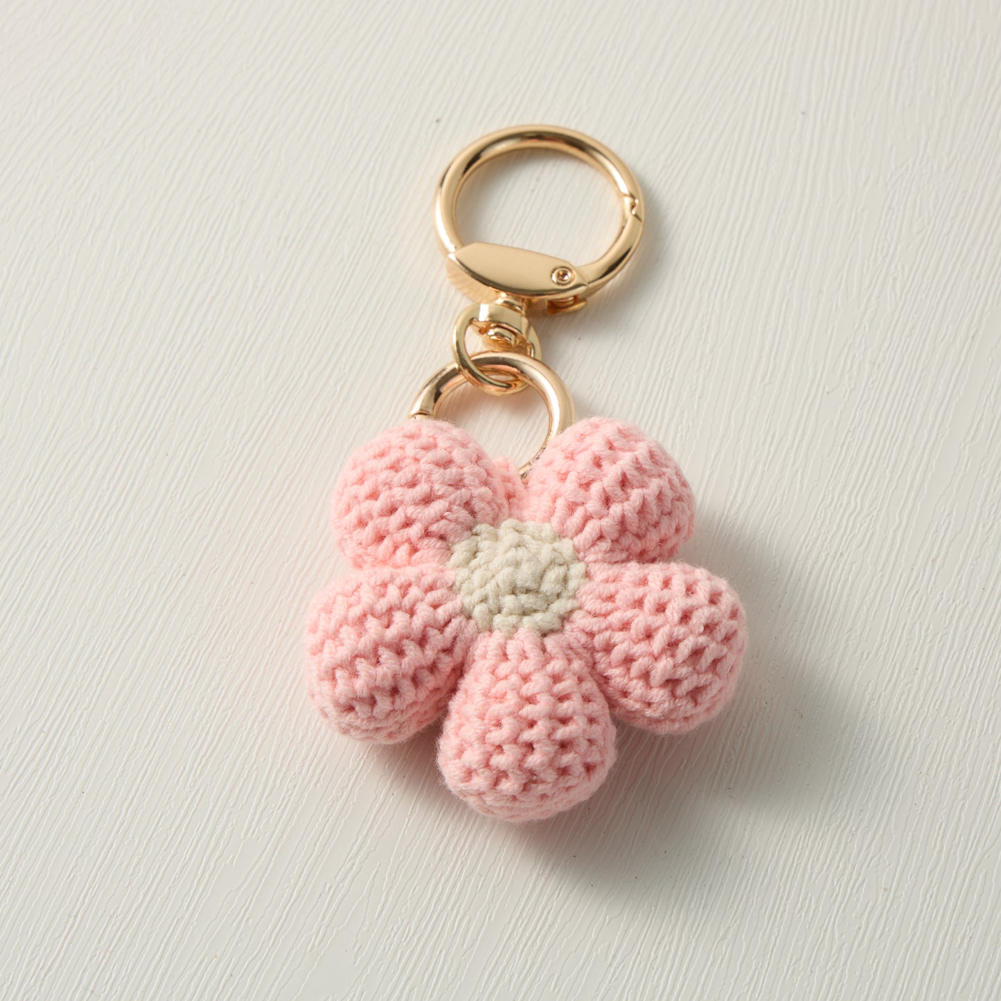Analyzing image Hand-Knitted-Pink-Flower-Keychain