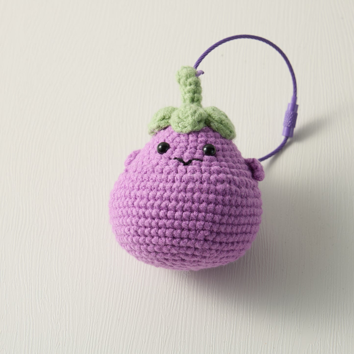 Plum Purple: Hand-Knitted Eggplant Keychain for a Touch of Elegance