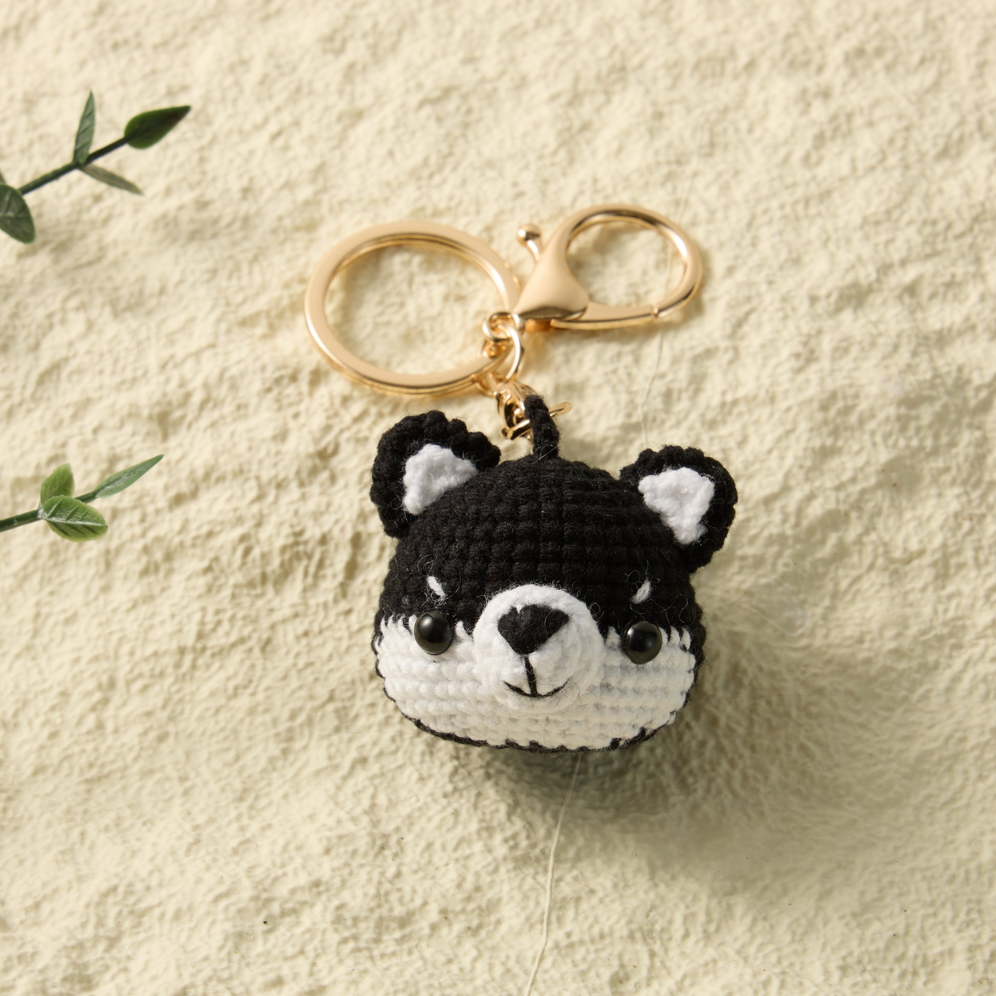  Analyzing image     Hand-Knitted-Husky-Dog-Keychain